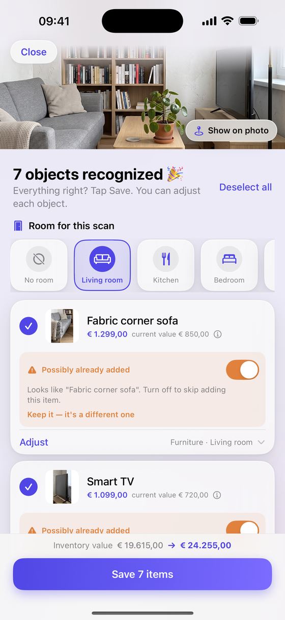 Scan result: 7 objects recognised in the living room, such as a fabric corner sofa of €1,299.00 and a smart TV of €1,099.00.